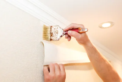 Pose de papier peint au Sap-André — revêtements muraux et toiles de verre